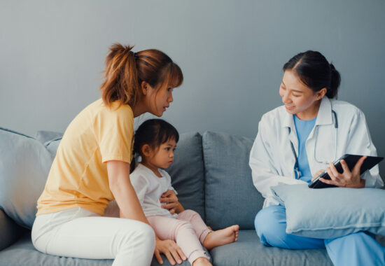 Mum and child talking to doctor